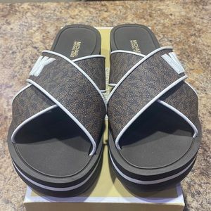 New Michael Kors sandals size 7.
